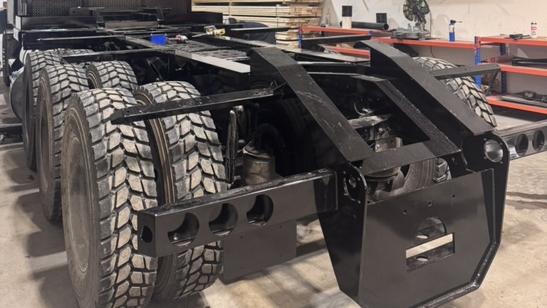 Close up of rear portion of custom Kenworth C500 deck build by Core Fabrication